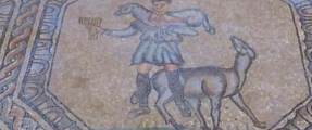 Photo of mosaic showing a shepherd and a sheep