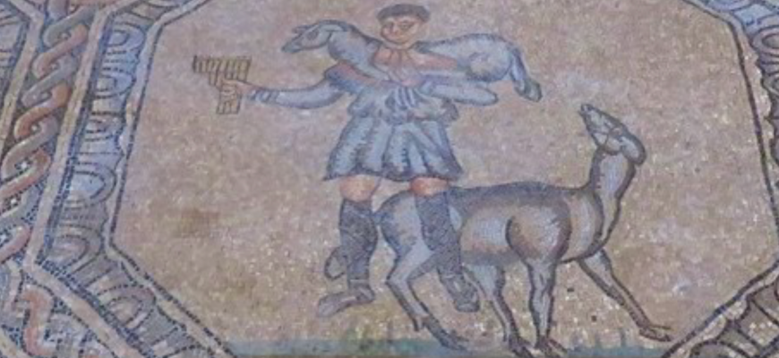 Photo of mosaic showing a shepherd and a sheep